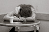 man taking nap with head on table